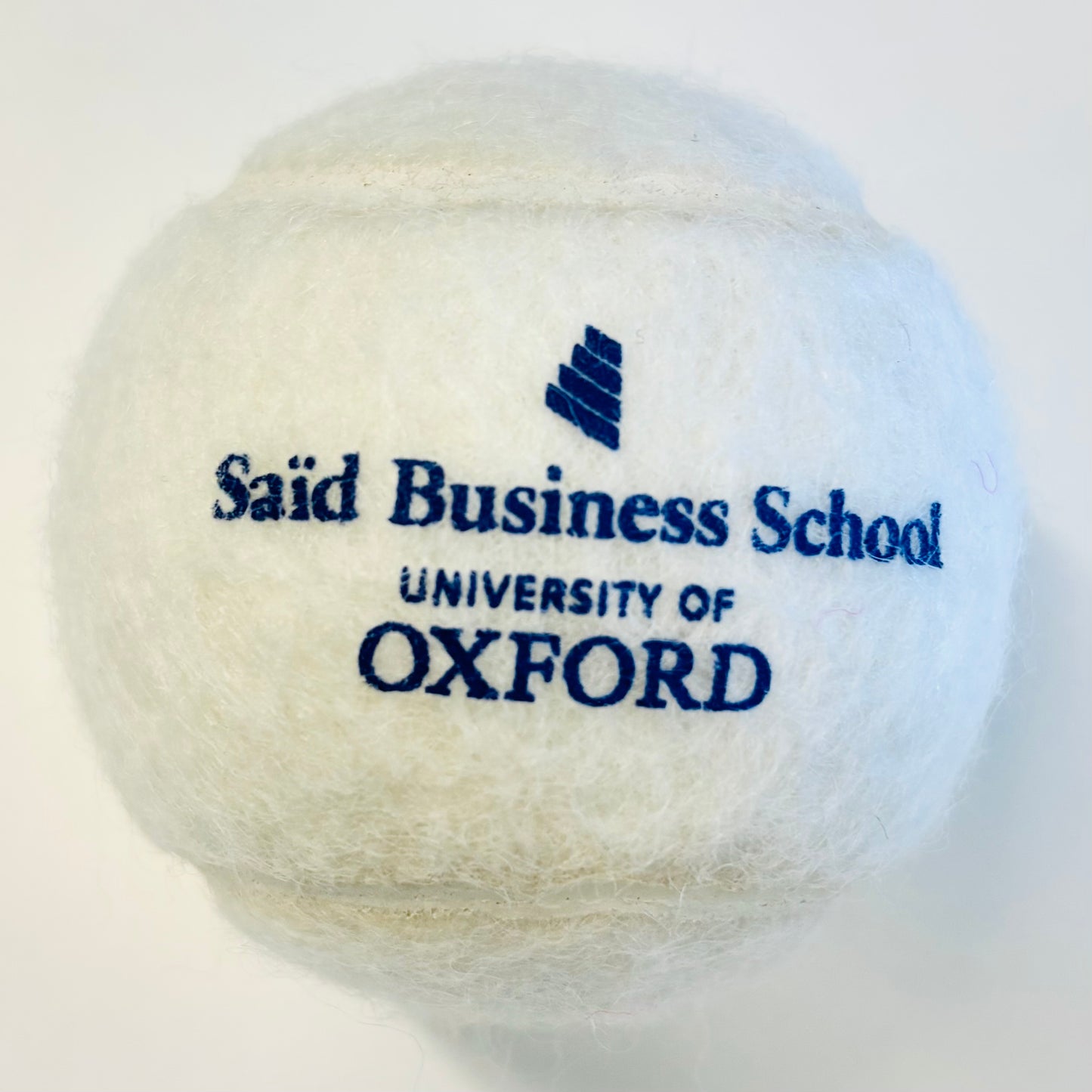 White single branded tennis ball